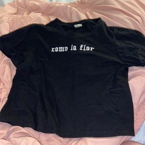 Black Selena Q shirt, Como la flor on written in white, Size small/ medium